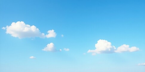 Fototapeta premium White clouds scattered across a clear blue sky with a few wispy strands, nature photography, , gentle movements