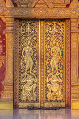 Buddhist decoration and Buddha statue in The Wat Xieng Thong Temple in Luang Prabang, Laos