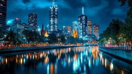 Naklejka premium Vibrant Night Cityscape Reflection on River in Melbourne, Australia