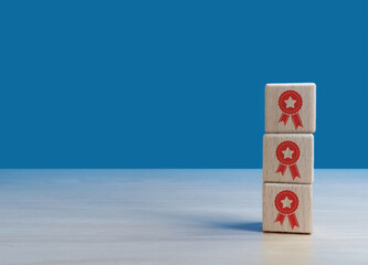 Certification concept, medals added on wooden blocks