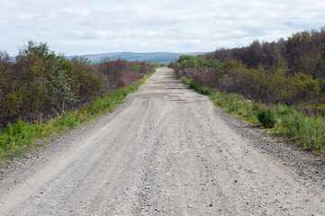 Gravel road in Northern Russia on the Rybachy Peninsula, Murmansk region