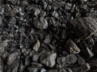 Charcoal texture, black coal pile, black charcoal