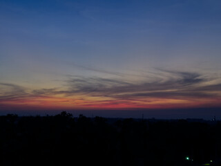 Sunset sky with dark clouds in the abstract background