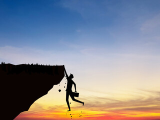 Businessman falls off a cliff, business crisis concept
