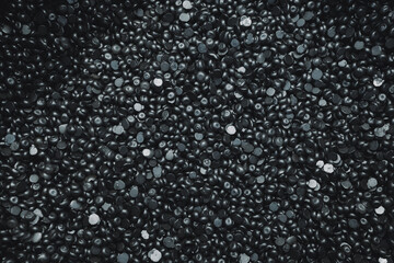 Dark silver abstract background of metallic Wax Granules