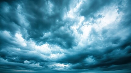 Obraz premium Photograph of a cloudy sky with dark storm clouds. Panoramic view of the cloudy blue sky, a stock photo, photorealistic.
