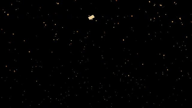 Golden confetti pop with dynamic explosion and falling particles on a transparent background