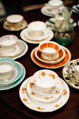 vintage cups and saucers on the table
