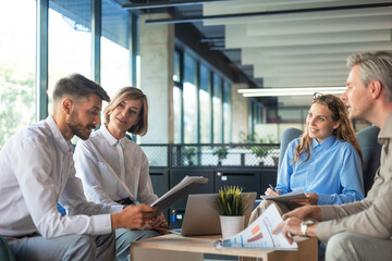 Successful business team have a meeting about new project in modern creative space