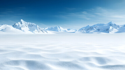 Obraz premium Vast Snowy Mountain Landscape Under a Blue Sky