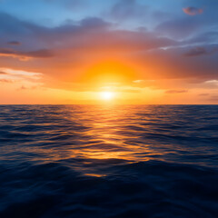 Obraz premium Vibrant Ocean Sunset: Golden Hues and Calm Waters
