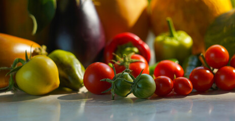 Zucchini tomatoes and other vegetables on the table
