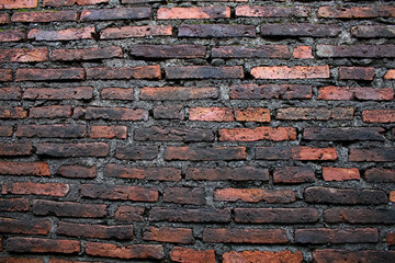 charred old brick wall background