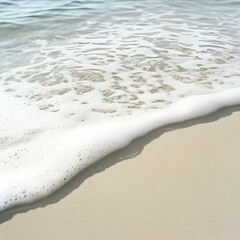 White Ocean Wave on Beige Sand Beach