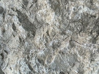 Close-up photograph of a gray granite stone surface
