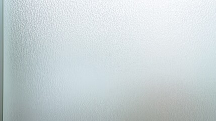 Textured glass surface with a soft, frosted appearance, providing privacy and diffusing light