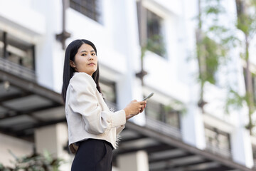 Future remote work combines technology smart phone connection online white digital business woman...