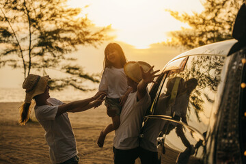 Asian family playing near car window at sunset feeling funny in holidays and relaxation together. Happy weekend travel enjoy summer at beach. summer vacation travel driving road trip concept