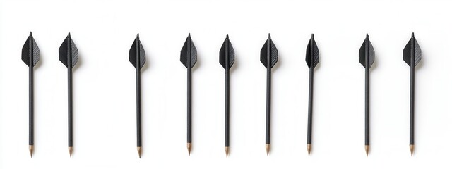 Black Arrow Pencils Arranged in a Line on a White Background for Creative Conceptual Use