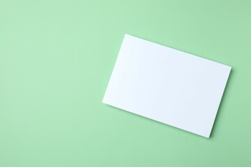 White paper card on color background