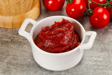 Red tomato paste in the bowl