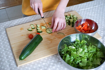 Person cutting vegetables