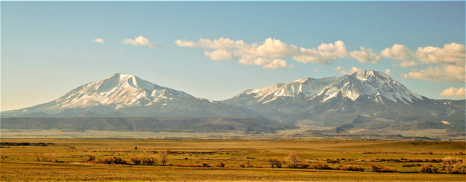 The Spanish Peaks are a pair of prominent mountains located in southwestern Huerfano County, Colorado. The Spanish Peaks were designated a National Natural Landmark in 1976.