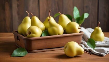 Fresh pears on a wooden kitchen table