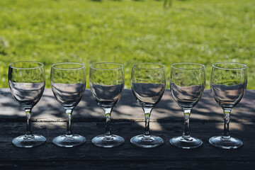 Paris, France - October 4, 2024: Six empty wine glasses on a table at Bordeaux