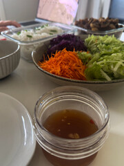 Crispy pork belly slices served with salad and Vietnamese fish sauce.