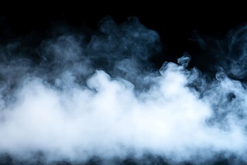 Fototapeta premium White cloud of smoke isolated on black background. Abstract background for design.