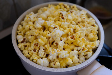 Making popcorn in non-stick frying pan.