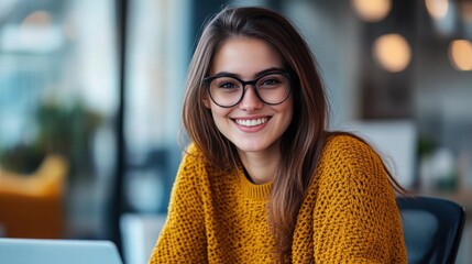 Cheerful young woman with brown hair enjoying a productive moment in a cozy cafe setting during the afternoon