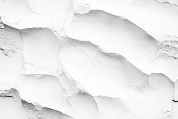 Obraz premium close up of a white wall with a rough texture. The wall appears to be made of sand and has a grainy, uneven surface. Scene is somewhat rugged and natural