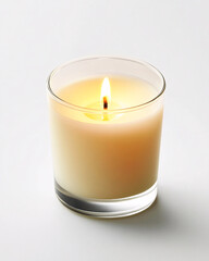 a single lit candle in a clear glass jar on a white background.