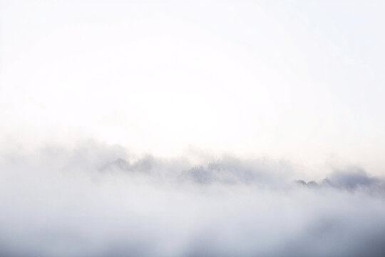 white mist foggy mountain landscape  nature background  nature scenery  minimalist  peaceful tranquil  cloudy sky  travel wanderlust  outdoor