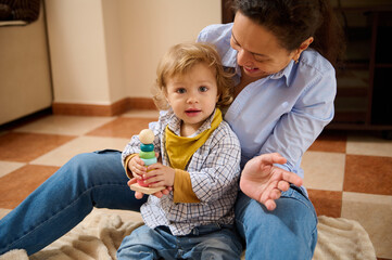 Cheerful Mother And Toddler Playing Together Indoors Creating Cherished Family Moments
