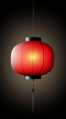 Obraz premium Red lantern glowing warmly in dark