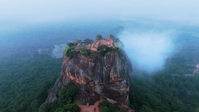 view of the famous ancient stone fortress Sigiriya (Lion Rock) on the island of Sri Lanka, which is a UNESCO World Heritage Site.