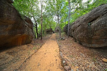 Phu Prabhat Historical Park. he is located between Udon Thani and Nong Khai, in north east thailand. a very nice place to visit if u are around.