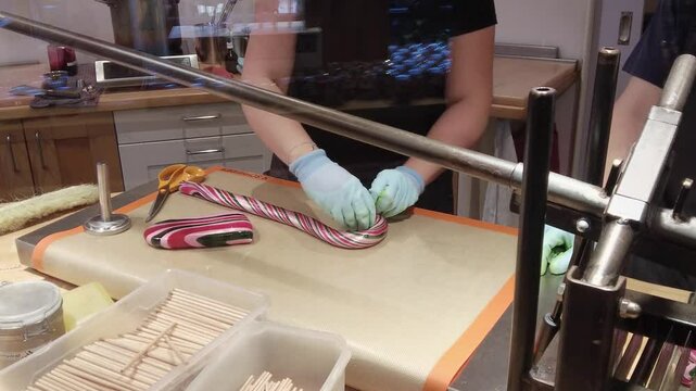Women making homemade lollies in a Bremen candy shop
