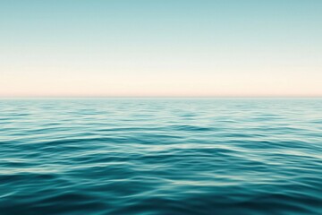 Fototapeta premium A serene seascape featuring calm, turquoise waters meeting a clear sky, evoking tranquility and natural beauty.