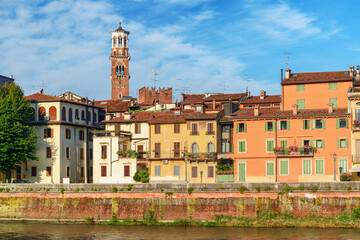 Colorful facades of old houses in morning sun, Verona, Italy