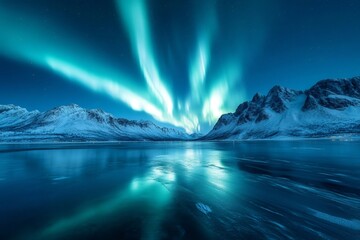 Fototapeta premium Stunning northern lights over snowy mountain landscape