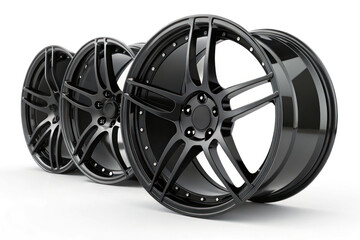 Obraz premium Car alloy black wheels on white background. Replacement and maintenance