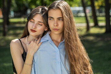 Fototapeta premium Fashion portrait of two girlfriends
