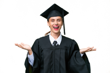 Young university graduate  caucasian woman over isolated background with shocked facial expression