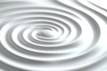 Swirling texture of soft cream highlights smooth curves and gentle patterns in a tranquil setting