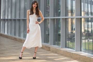 Full body portrait of a young beautiful brunette woman