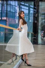 Full body portrait of a young beautiful brunette woman